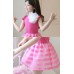 GI0616 เดรสเด็กผู้หญิง แขนระบาย แต่งดอกไม้ที่อก สีขาว กระโปรงลายขวางผ้าแก้ว สีชมพู S.100/120